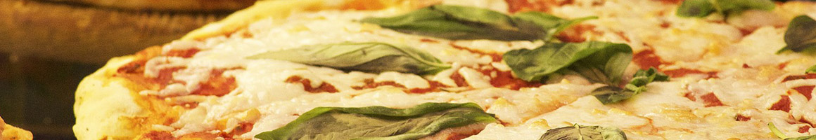 Eating Pizza at Round the Corner Carryout restaurant in Gibsonia, PA.